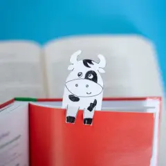 Urocza zakładka do książki w kształcie krowy, idealna jako szablon przedszkole.